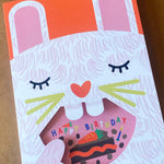 bunny Eating Cake Birthday Card with cut-out mouth